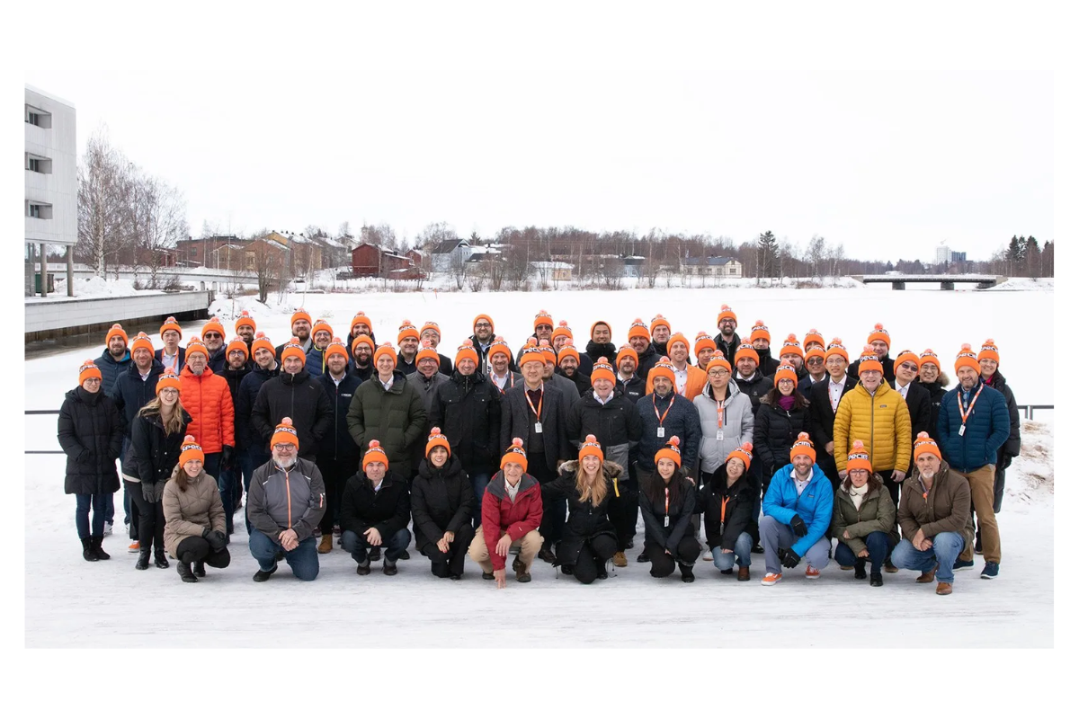 Specim distributors posing in front of frozen lake in winter in Finland